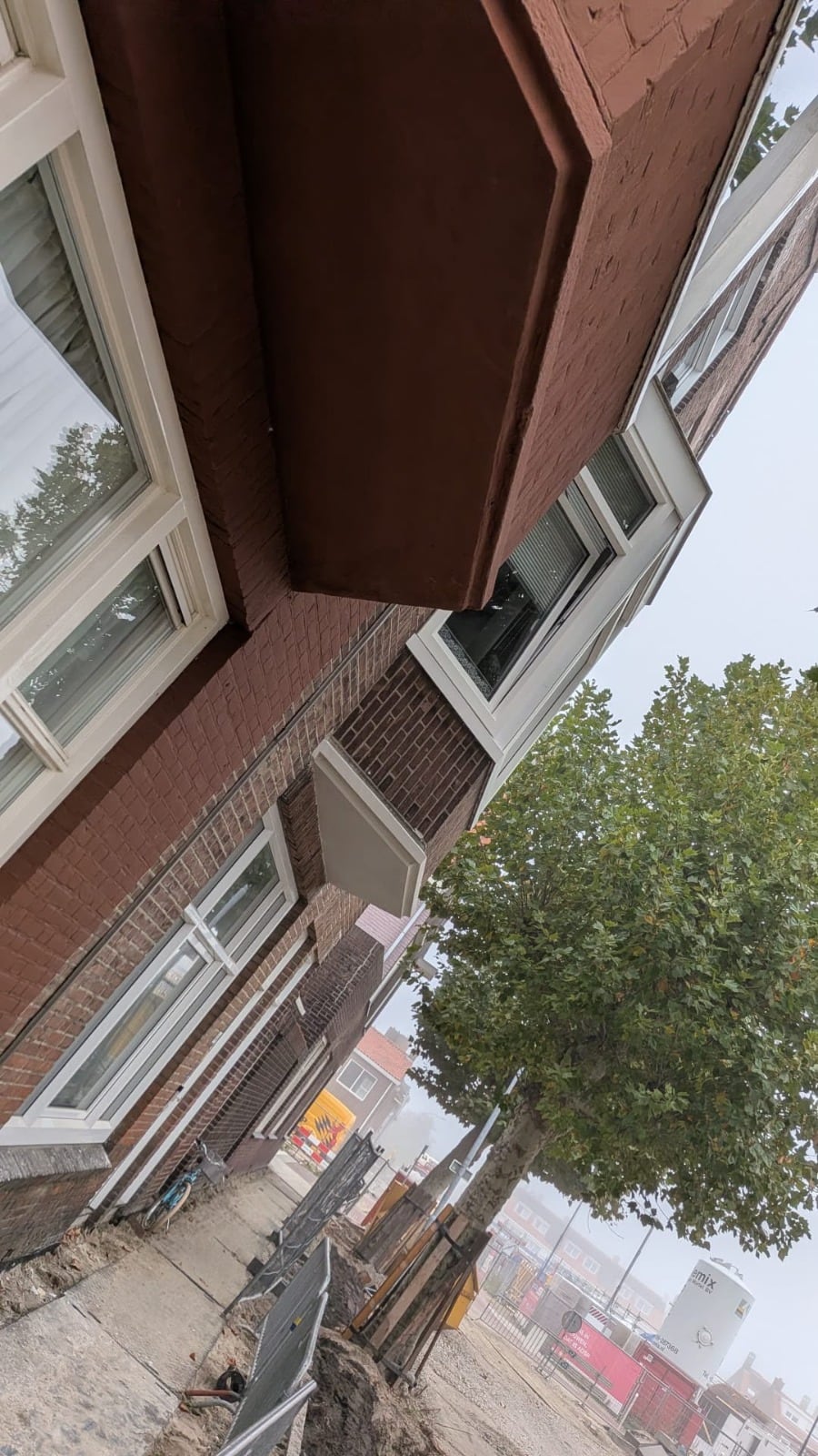 Betonherstel aan een erker