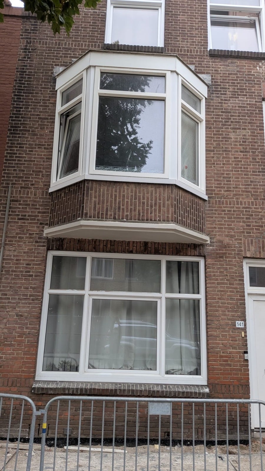Betonherstel aan een erker