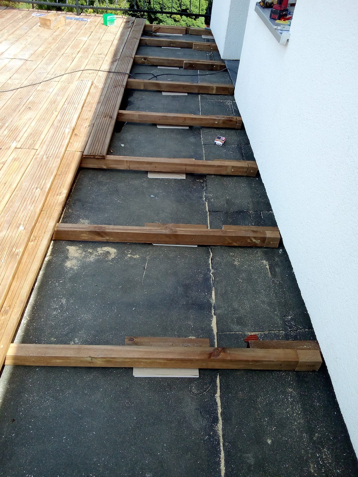 Houten vlonderterras op plat dak, Voor