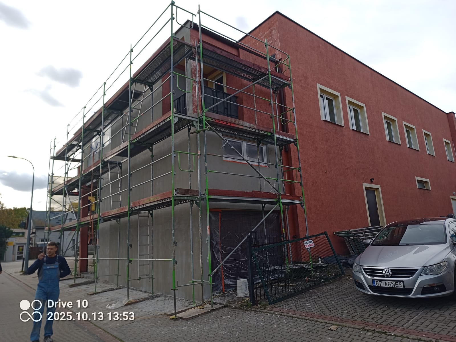 Gevelisolatie en sierpleister bedrijfspand, Voor