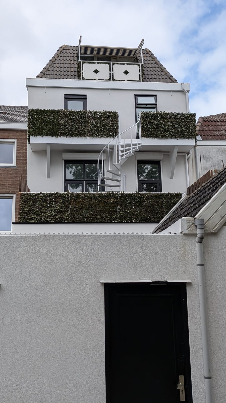 Renovatie achtergevel met dakterras
