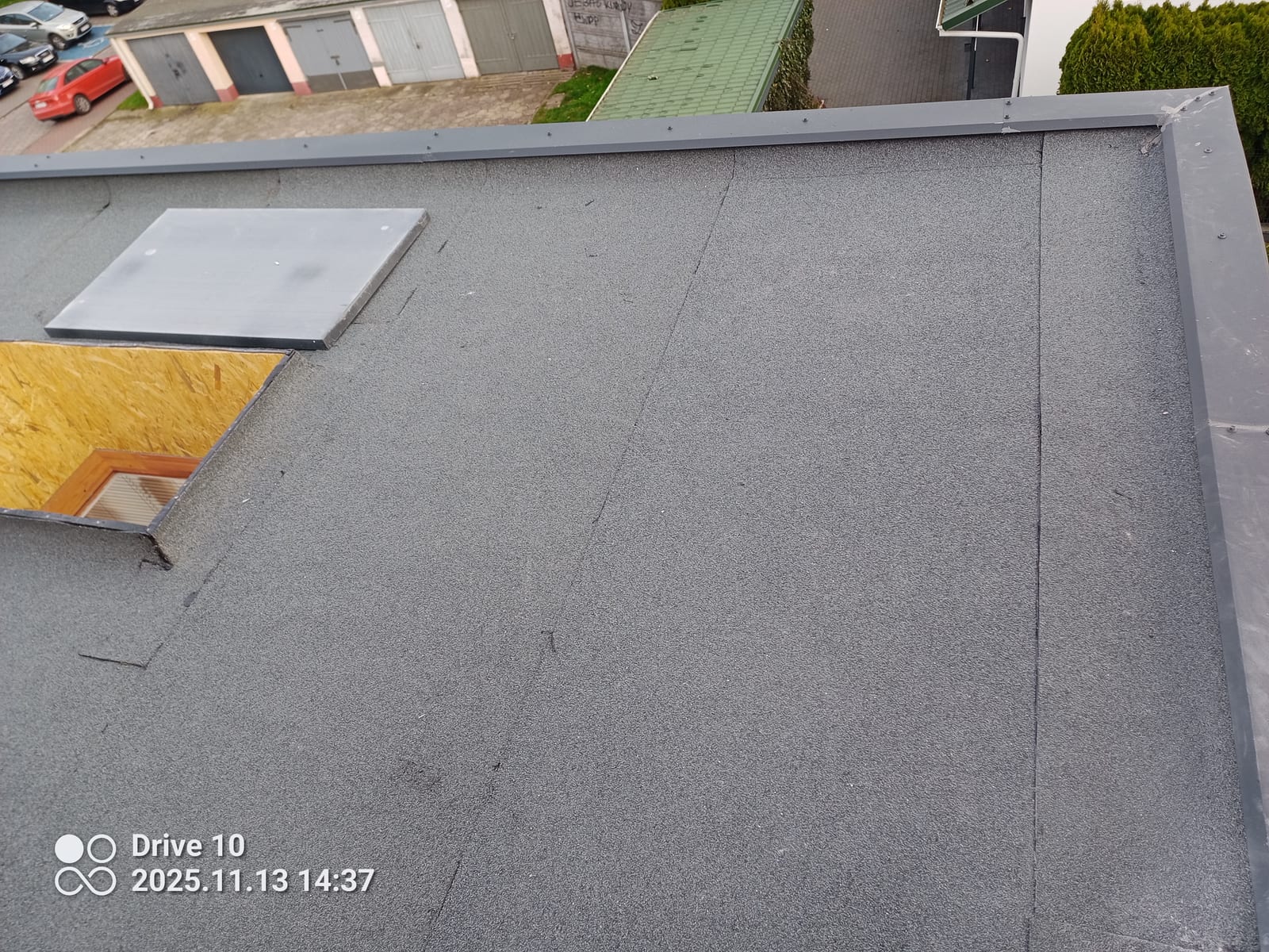 Plat dak vernieuwd met dakluik, Na